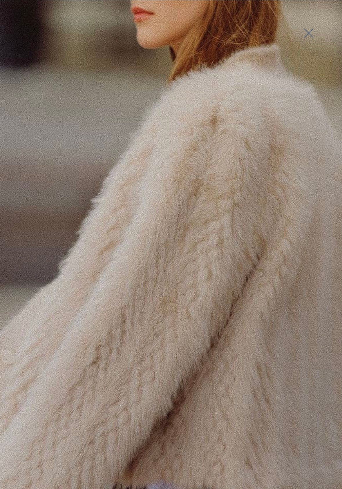 woman wearing faux fur video transition